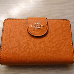 コーチ 二つ折り財布 オレンジ